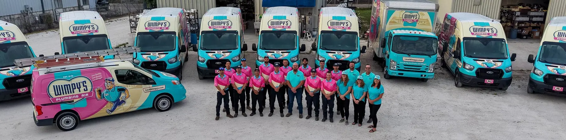 team with branded trucks